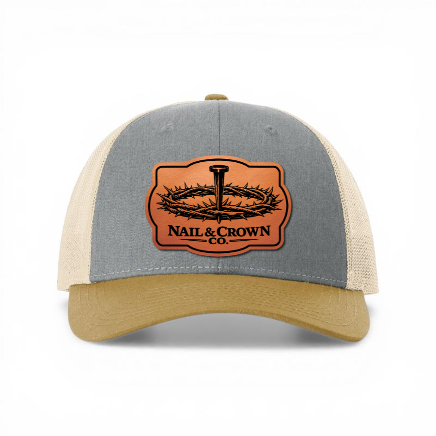 Richardson 112 Trucker Hat with Nail & Crown Co. leather patch logo, Heather Grey and Amber Gold colorway
